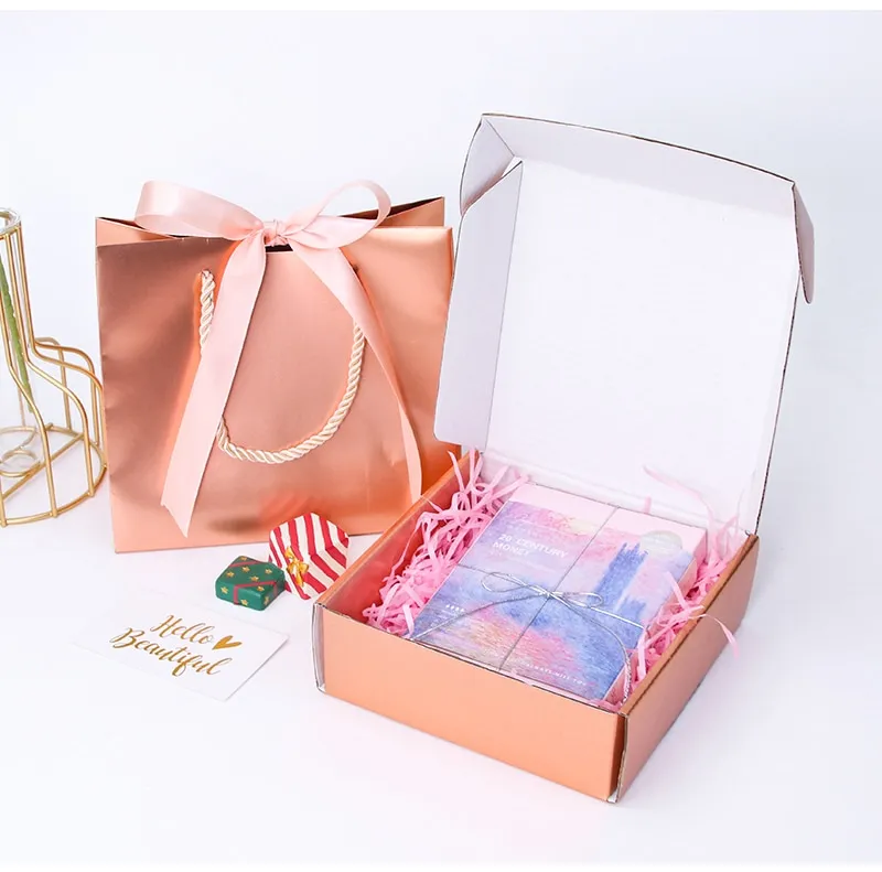 Laser gift paper bag holiday party gold and silver packaging carton ribbon small  paper bag