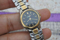 นาฬิกา Vintage มือสองญี่ปุ่น GIAN FRANCO ARMANI ระบบ QUARTZ ผู้หญิง ทรงกลม กรอบทอง หน้าดำ หน้าปัด 25มม. สายสแตนเลสแท้ ใช้งานได้ปกติ สภาพดี ของแท้ ไม่กันน้ำ