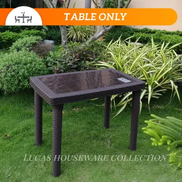 Brown rattan store table only