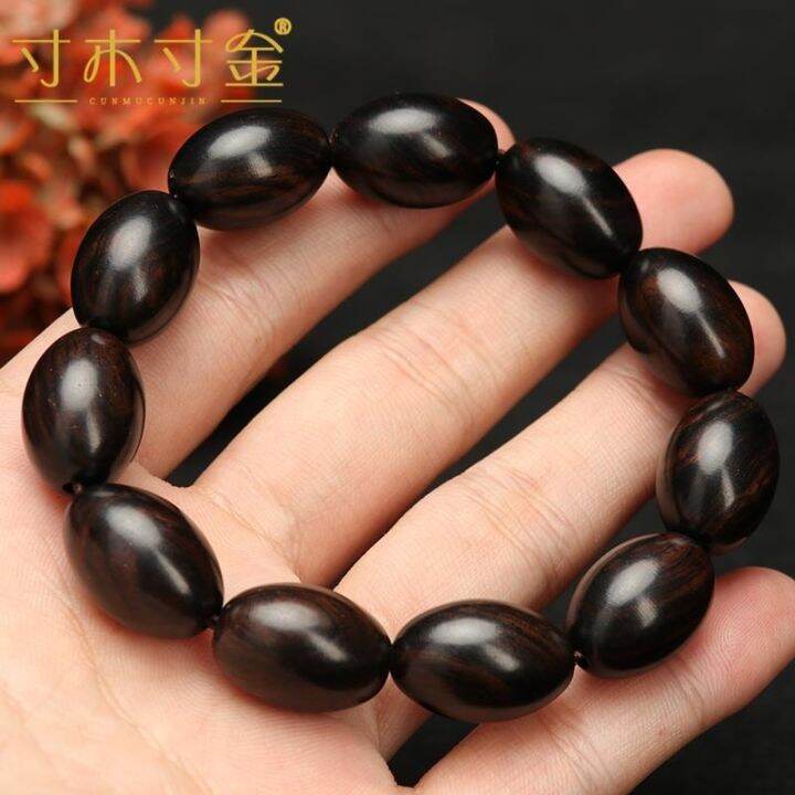 ใหม่มาถึงสีดำสร้อยข้อมือลูกปัดพุทราไม้จันทน์สีม่วงลูกคิดไม้จันทน์ลูกปัดวัสดุเก่าจมอยู่ใต้น้ำพื้นบ้านลูกปัดผู้ชายและผู้หญิงของสร้อยข้อมือ