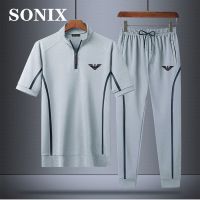 SONIX T เสื้อผู้ชายสไตล์ใหม่2021ฤดูร้อนชุดกีฬาสันทนาการเสื้อยืดแขนสั้นผู้ชายกางเกงขาสั้นผู้ชายเก้าจุดกางเกงหลวมขนาดใหญ่ Breathable บาง2ชิ้นชุด