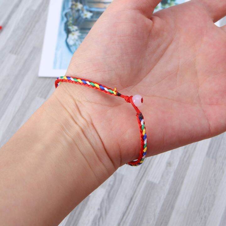 10pcs-handmade-ถักทอมิตรภาพสร้อยข้อมือสายสีแดงเทศกาลแข่งเรือมังกร