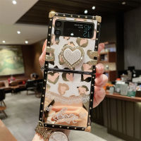 เคสแบบพับปิดได้สำหรับ Samsung Galaxy Z Flip3 5G Z พลิก3 Z Flip4 Z กรณีโทรศัพท์ผู้หญิงกระจกกระจกหัวใจผู้หญิงเคสซิลิโคนนิ่มเต็มรูปแบบป้องกันการตกความคิดสร้างสรรค์ส่วนบุคคลแฟชั่นฝามีที่ถือวงแหวนโทรศัพท์สี่เหลี่ยม