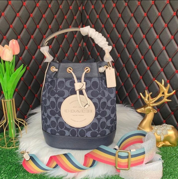 COACH Dempsey Drawstring Bucket Bag In Signature Denim in Blue