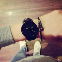 【Hot Sale】 Korean version of the watch female fashion student new turntable personality creative belt black and white pair simple quartz