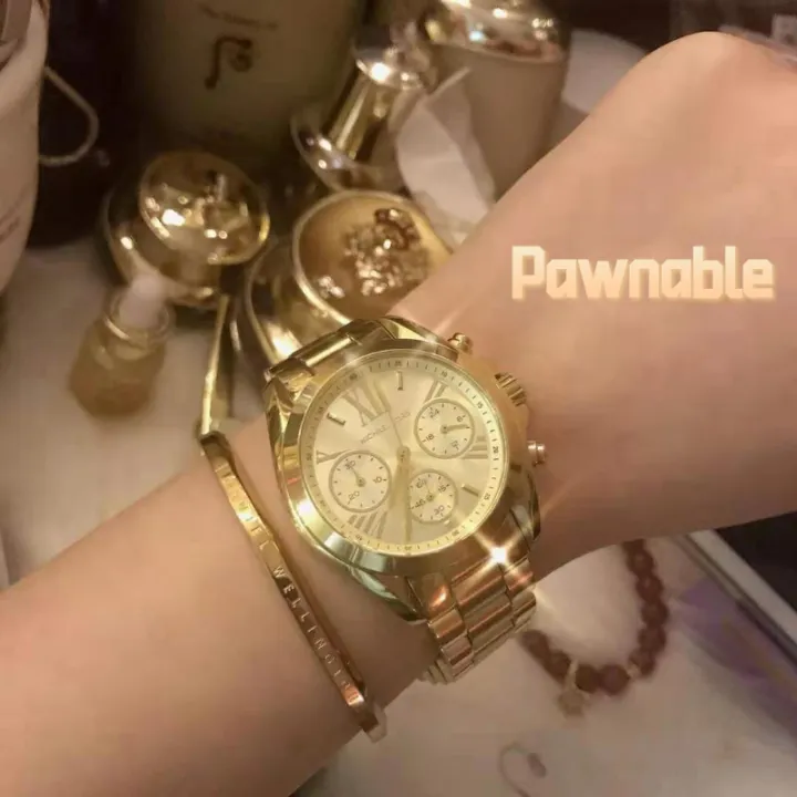 michael kors watch real gold