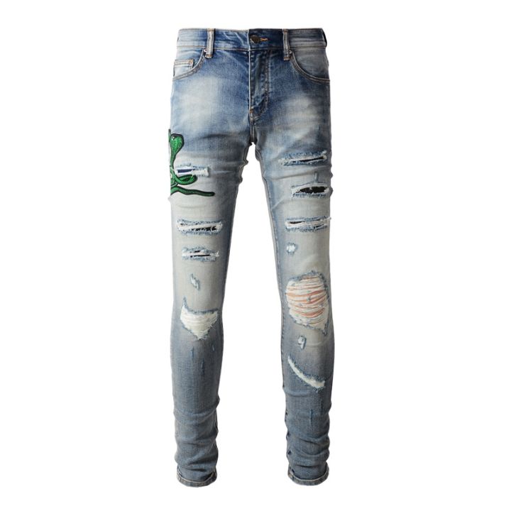 trendamiri-street-fashion-man-jeans-กางเกงยีนส์สีน้ำเงินสลิมฟิตงูเห่าเย็บปักถักร้อยพิมพ์กางเกงยีนส์เทรนด์ของผู้ชาย