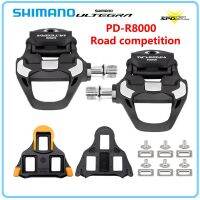 SHIMANO ULTEGRA แป้นเหยียบ SPD-SL PD-R8000คาร์บอนเบาพิเศษล็อคตัวเองด้านเดียวที่มีปุ่มสตั๊ด SM-SH11สำหรับเหยียบแข่งขันบนท้องถนน