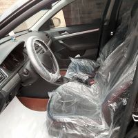 ผ้าคลุมเบาะนั่งรถตู้รถยนต์ทำจากพลาสติกแบบใช้แล้วทิ้งผ้าคลุมยานพาหนะป้องกันแบบม้วนได้100ชิ้น