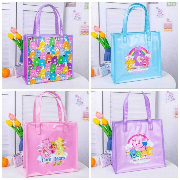 carebear-กระเป๋าใบเล็ก-มีทั้งหมด-4-สี-ลาย-full-print-งาน-pvc-พลาสติกหนา-กันน้ำ-มีกระดุมติดปากกระเป๋า-ขนาด-27-27-10-cm