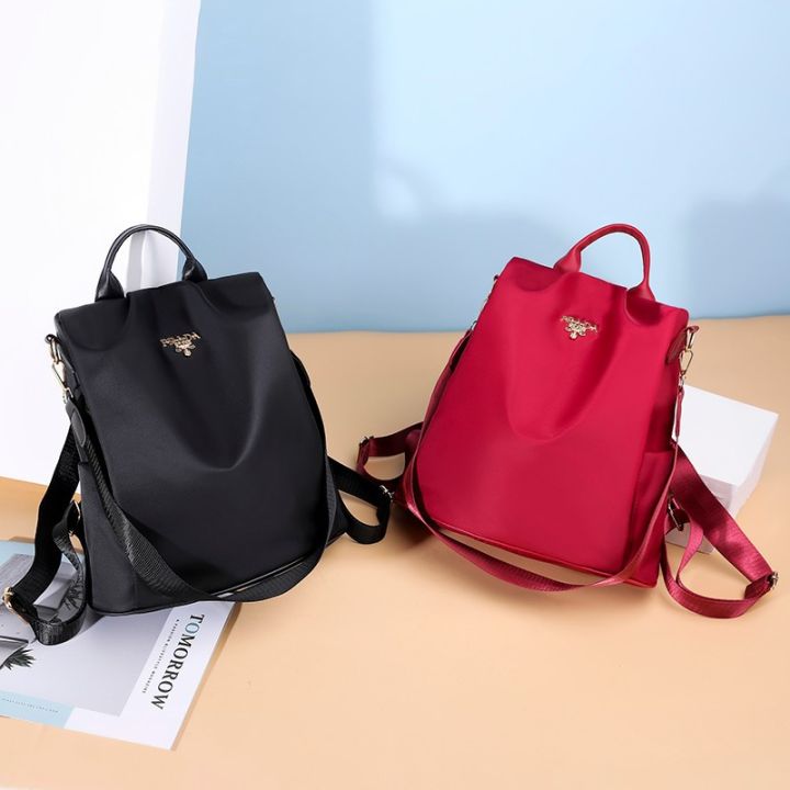 กระเป๋าเป้สะพายหลังกระเป๋าผู้หญิงกันขโมยสไตล์วิทยาลัย-2023-ใหม่ผู้ผลิตกระเป๋าเป้สะพายหลังไนลอนขนาดใหญ่ขายส่ง