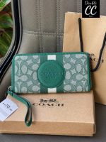 ?DEMPSEY LARGE PHONE WALLET IN SIGNATURE JACQUARD WITH STRIPE AND PATCH