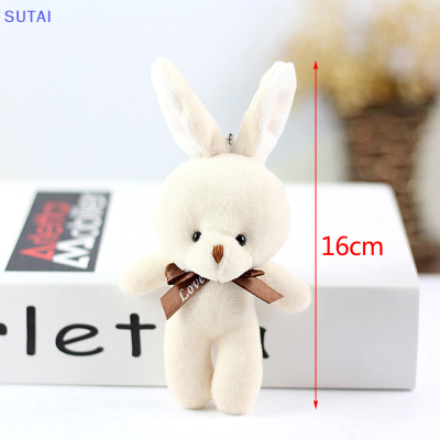 💖【Lowest price】SUTAI ตุ๊กตากระต่ายผ้ากำมะหยี่ผูกโบว์ผ้าไหมสีสดใสของเล่นตุ๊กตากระต่ายของขวัญเล็กๆสำหรับปาร์ตี้งานแต่งงานกระเป๋าพวงกุญแจห้อยโทรศัพท์มือถือทำจากผ้าฝ้าย PP นุ่มยัดไส้กระต่าย