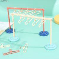 New 1set Cute Mini Plastic Hangers Coat Dress Top Pants Miniature Clothes Stand Dollhouse Toy Dolls Accessories 2022