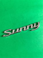 โลโก้ SUNNY ขนาด 18x3.6 cm. ติดท้ายNISSAN