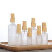 15Pcs Mist Spray Bottles 5Ml10ml15ml20ml30ml50ml100ml Pump False Wood Lid Oil Liquid Container Frosted Glass Refillable Bottle