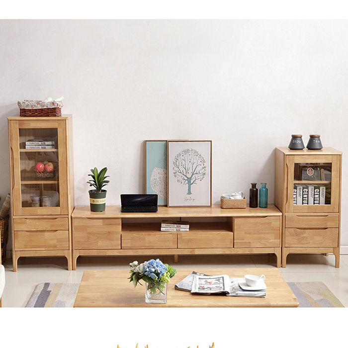 Kệ tivi gỗ tự nhiên dài 1m8 kèm tủ hai bên là một món đồ nội thất tuyệt vời để tăng tính thẩm mỹ cho phòng khách của bạn. Sản phẩm được làm từ gỗ tự nhiên cao cấp, với màu sắc ấm áp và thân thiện với môi trường. Thiết kế thông minh giúp bạn tận dụng tối đa không gian và sắp xếp các vật dụng một cách dễ dàng.
