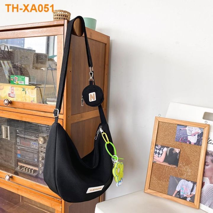 กระเป๋าสะพายไหล่ผ้าแคนวาสญี่ปุ่นขนาดเล็กหญิง-2023-ใหม่น่ารักกระเป๋าเกี๊ยวเรียบง่าย-messenger-กระเป๋า