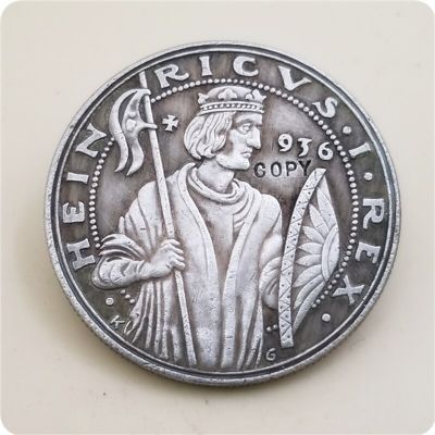 1936เยอรมนี: เหรียญรีชเหรียญที่สาม1000ปีที่ระลึกของไฮน์ริช I. ออกแบบโดยเหรียญเลียนแบบ Karl Goet