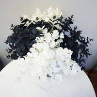 Retro simulation flower white eucalyptus silk flower living room simple black light luxury shooting art props money leaf