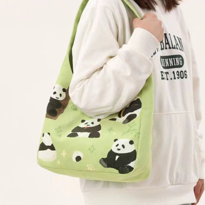 กระเป๋าสะพายคาดไหล่ไหล่นักเรียนกระเป๋าโท้ทความจุมากกระเป๋าผ้าใบน่ารักหมีแพนด้าผู้หญิง