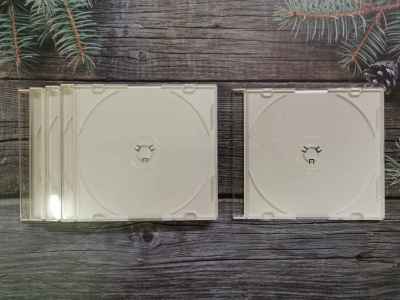 กล่องเปล่าใส่แผ่น CD / DVD SLIM สีขาว  (หนา 5 mm.) แพ็คละ 5 แผ่น