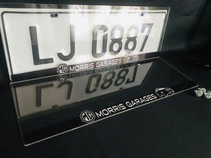 Morris Garages Car License Plates Shields 2 Pack SAFE Design Novelty