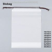 ▣▪ xianhaochen048906 Stobag 50 pçs transparente fosco roupas embalagem drawstring sacos de armazenamento viagem bolso sapatos organizador bolsas à prova dwaterproof água logotipo