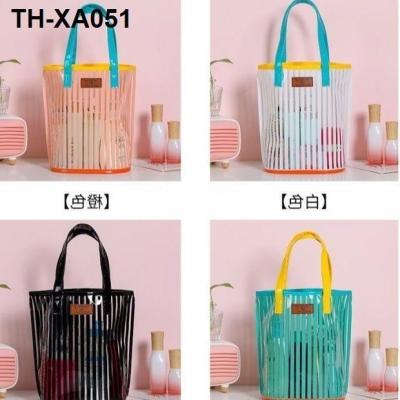 2022 new atmosphere stripe transparent jelly bag to receive travel portable beach is received