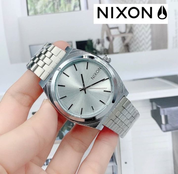 นาฬิกาข้อมือ-nixon-นาฬิกาสายเลส-ปรับสายเลื่อนได้-ระบบ-analog-ขนาด-หน้าปัด-38-mm-สินค้ามีถ่าน-ผ้าเช็ค-ถุงผ้าแถมให้นะคะ