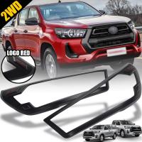 ครอบไฟหน้า ครอบกันรอบไฟหน้า รุ่น โตโยต้า รีโว้ Toyota Hilux Revo 2WD ปี 2020-2022 สีดำด้าน โลโก้แดง จำนวน 2 ชิ้น