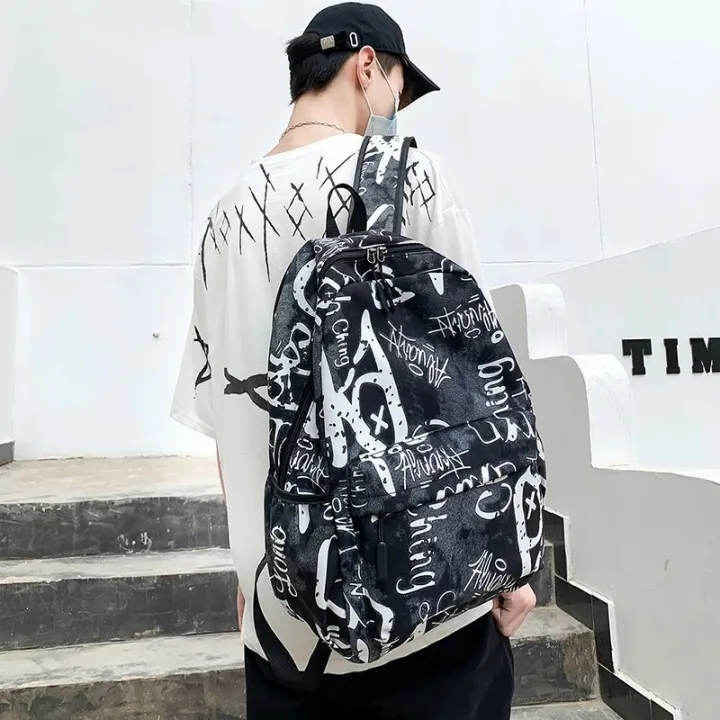 fashion-men-backpack-cool-school-bags-for-teenager-boys-camouflage-text-student-book-bag