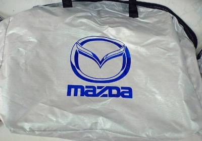 ผ้าคลุมรถซิลเวอร์โค๊ต (แบบหนา) MAZDA 3 4D แถมฟรี! ม่านบังแดด 1 ชิ้น