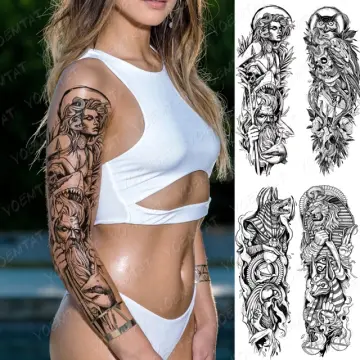 Medusa tattoo on the left inner arm
