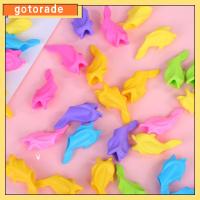 GOTORADE Random Color มืออาชีพ นักเรียน ตามหลักสรีรศาสตร์ กริปช่วยเขียน เครื่องมือแก้ไขท่าทาง ที่จับดินสอซิลิโคน ที่วางกริ๊ปฝึก