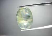 พลอยหลังเบี้ย ไหมเขียว (Green Rutilated Quartz)  น้ำหนัก13.01 ct. ขนาด 13*6.1*17.8 mm. พลอยแท้ 100% เนื้อดี ราคาถูก