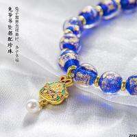 Xiangji สร้อยข้อมือแบบเดียวกันสร้อยข้อมือแก้วสีเทาหอม Duobao กลืนสัตว์สีทองหนังสือสีแดงขนาดเล็กโลหะผสมหลากสี แก้ว A03 รุ่น