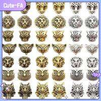 CUTE-FA 42 PCS สัตว์สัตว์สัตว์ ลูกปัดสเปเซอร์รูปสัตว์ทิเบตแบบหลวม นกฮูกจิ้งจอกสิงโตผสมเสือดาว ของทิเบตทิเบต เครื่องรางรูปสัตว์ การทำเครื่องประดับงานฝีมือ DIY โลหะผสมอัลลอยด์ ลูกปัดสัตว์จำนวนมาก สร้อยคอสำหรับผู้หญิง