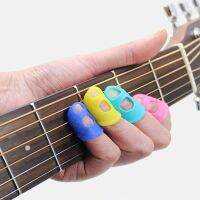 4Pcs กีตาร์ Fingertip Protector Fingerstall ซิลิโคนกีตาร์ String Finger Guard Protection กด Ukulele Bass Guitar อุปกรณ์เสริม