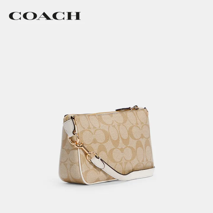 coach-กระเป๋าคล้องมือผู้หญิงรุ่น-nolita-19-in-signature-canvas-สีครีม-c3308-imdqc