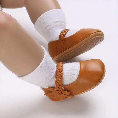 รองเท้าเด็กอ่อนนุ่มรองเท้าเด็กผู้หญิงทารกพื้นโบว์หนัง PU รองเท้ากันลื่นส้นเตี้ย