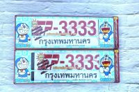 กรอบป้ายทะเบียนกันน้ำsp3333ลายdoraemonแบบยาวยาว