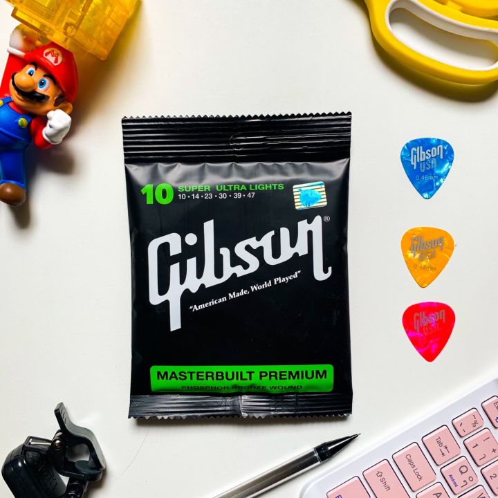 สายกีต้าร์โปร่ง-gibson-usa-เบอร์-10-เเถมฟรีปิ๊กกีต้าร์-3-อัน-1ในสายกีต้าร์โปร่งที่ได้รับความนิยมที่สุด-gibson-เสียงคมใส-ให้โน้ตชัดเจน-ราคาถูก