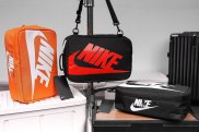 Nike shoes bag is 100% polyester, water resistant, removable strap