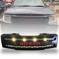 กระจังหน้า หน้ากระจัง มีไฟ LED สีเหลือง รุ่น นิสสัน นาวาร่า NISSAN NAVARA D40 ปี 2005 - 2014 สีดำด้าน โลโก้แดง 1 ชิ้น