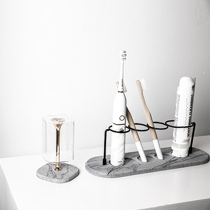 ที่ใส่แปรงสีฟันอเนกประสงค์แบบโครงชั้นวางของที่ใส่แปรงสีฟันชั้นที่วางยาสีฟันวางถ้วยอุปกรณ์อาบน้ำ