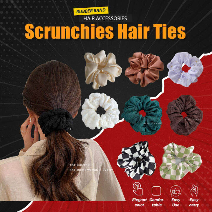 Rubber band hair ties, huge intestine hair bands, and small daisy hair