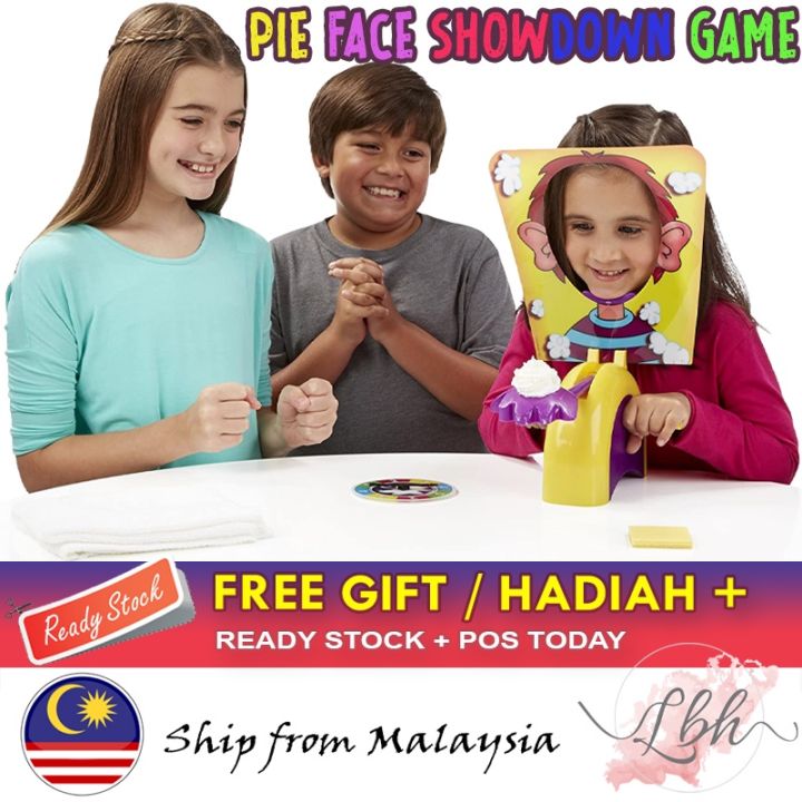 Man playing child's game with whipped cream on face Stock Photo