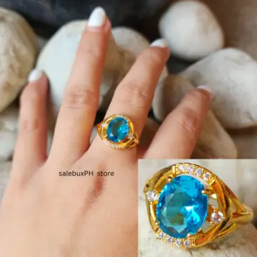Horizontally Set Oval Cabochon Cut Blue Topaz Ring – Schmitt Jewelers