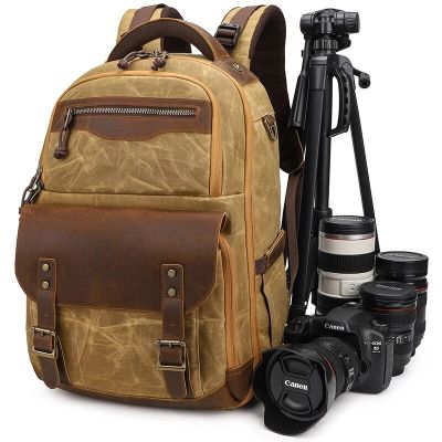 กระเป๋าเป้สะพายหลังกันน้ำหนังผ้าใบบาติกสำหรับการถ่ายภาพ J76แนวย้อนยุคพร้อมพอร์ต USB ขนาด15.4นิ้วกระเป๋ากล้องแล็ปท็อปผู้ชาย